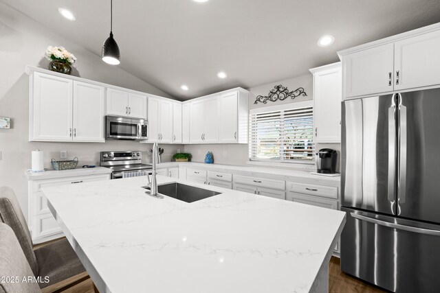 16147 W Apache Way, Peeples Valley, AZ 86332 - kitchen with a sink, appliances with stainless steel finishes, recessed lighting, white cabinetry, and a center island with sink