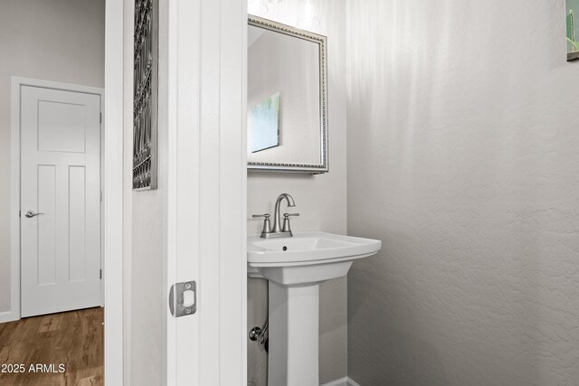 16147 W Apache Way, Peeples Valley, AZ 86332 - bathroom with wood finished floors