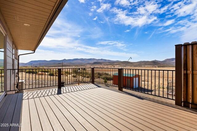 16147 W Apache Way, Peeples Valley, AZ 86332 - wooden terrace featuring a mountain view