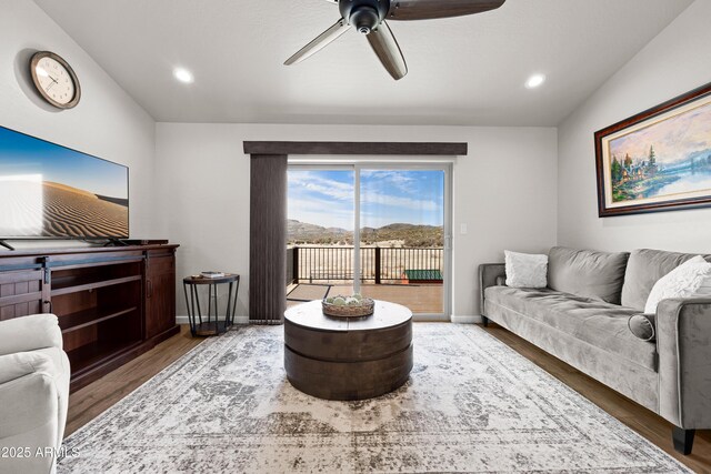 16147 W Apache Way, Peeples Valley, AZ 86332 - living room featuring recessed lighting, baseboards, a ceiling fan, and wood finished floors