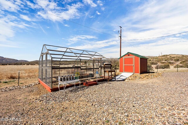 16147 W Apache Way, Peeples Valley, AZ 86332 - view of shed featuring a mountain view