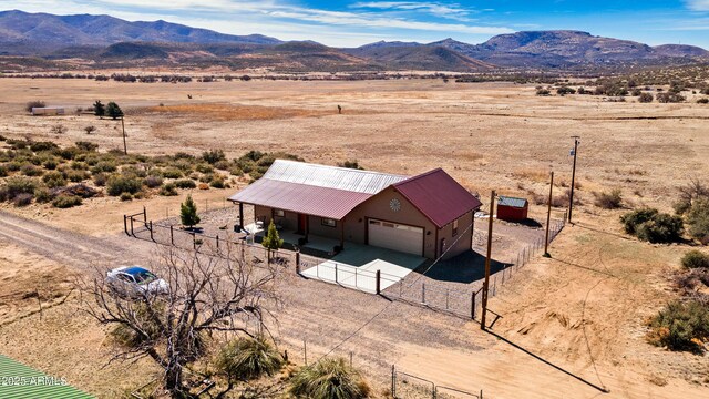 16147 W Apache Way, Peeples Valley, AZ 86332 - birds eye view of property with a rural view, a mountain view, and view of desert