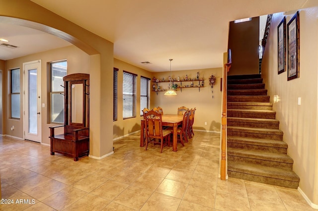 dining room with light tile patterned floors