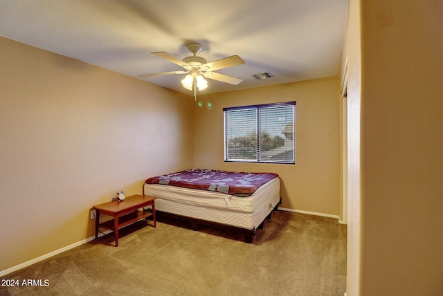 bedroom featuring ceiling fan and carpet flooring