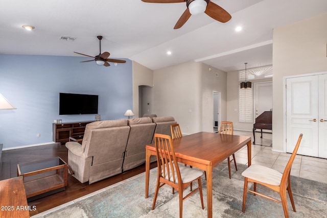 dining area featuring arched walkways, recessed lighting, visible vents, a ceiling fan, and vaulted ceiling