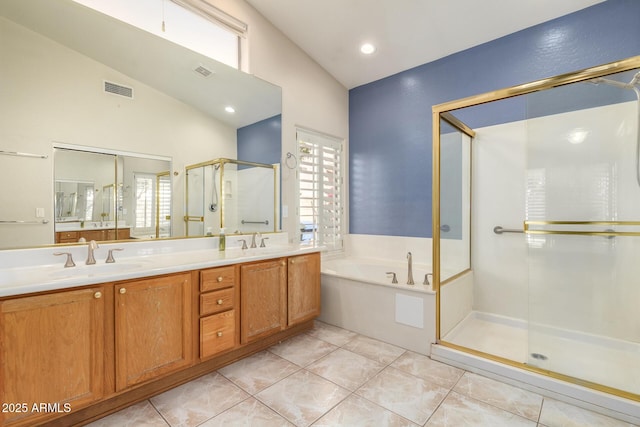 full bathroom with lofted ceiling, a sink, a shower stall, and a bath