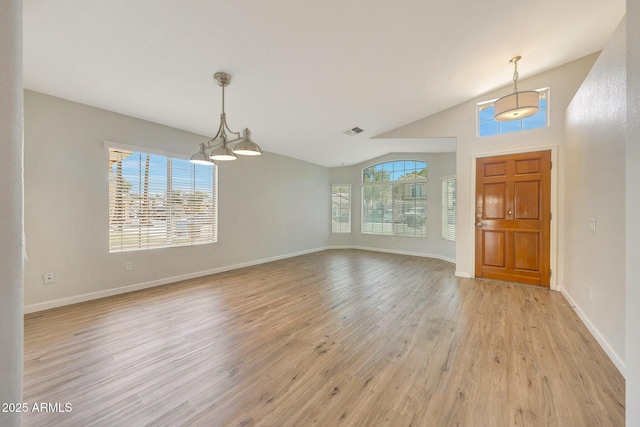 166 W Merrill Ct, Gilbert, AZ 85233 - entrance foyer with light wood finished floors, a chandelier, and lofted ceiling