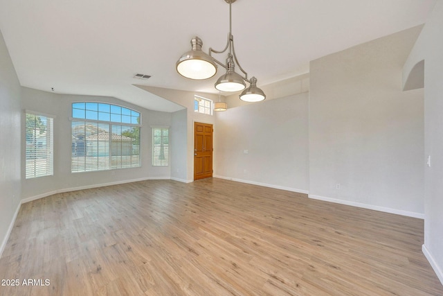 166 W Merrill Ct, Gilbert, AZ 85233 - unfurnished room with light wood-style floors and lofted ceiling