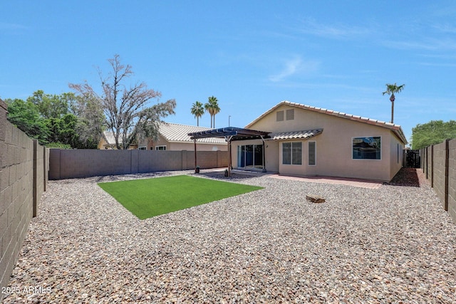 166 W Merrill Ct, Gilbert, AZ 85233 - rear view of property with a pergola, a tile roof, stucco siding, a fenced backyard, and a patio