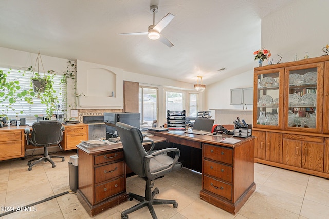 office area featuring lofted ceiling, ceiling fan, and light tile patterned flooring