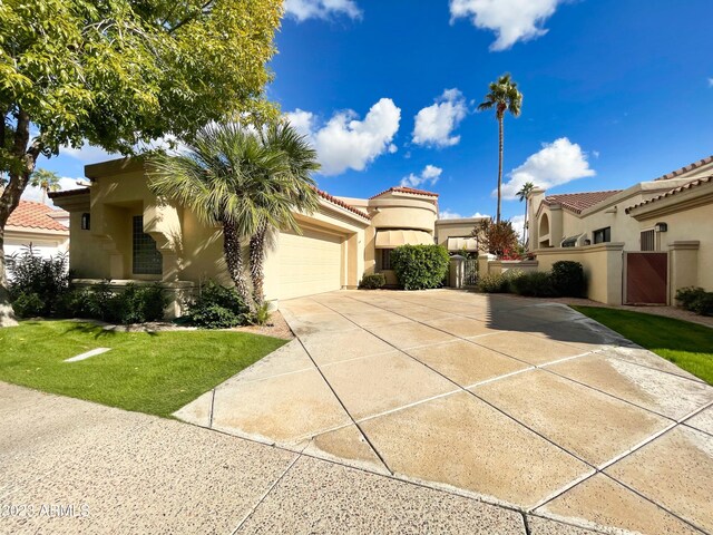 mediterranean / spanish-style house featuring a garage