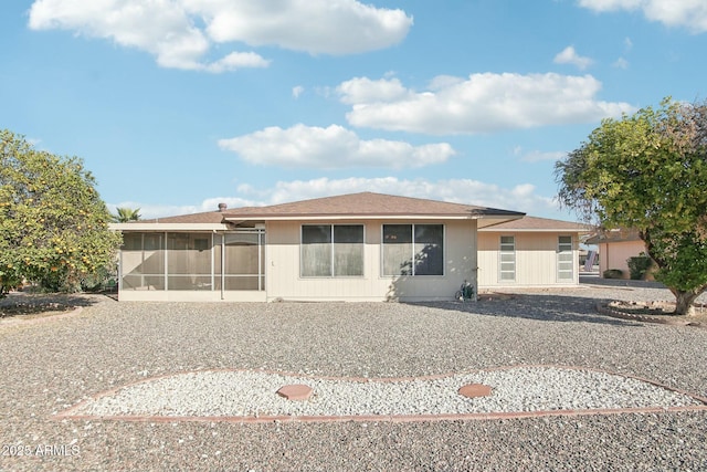 view of front of property featuring a sunroom