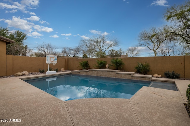 view of swimming pool with a fenced in pool and a fenced backyard