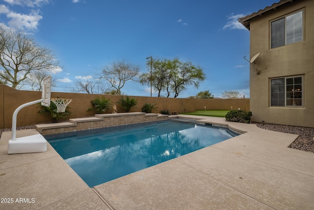 view of pool featuring a fenced in pool, a patio, and a fenced backyard