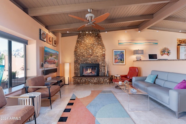 tiled living room featuring a stone fireplace, beam ceiling, ceiling fan, and high vaulted ceiling