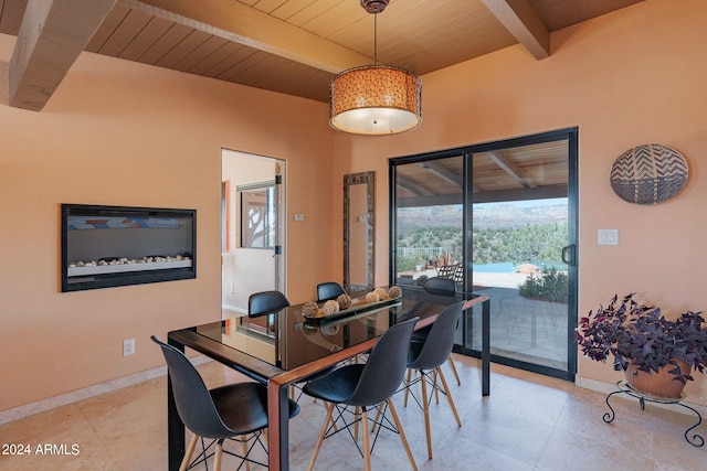 dining area with wood ceiling and beamed ceiling