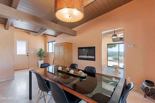 dining area featuring wooden ceiling, light tile patterned floors, lofted ceiling with beams, and ceiling fan