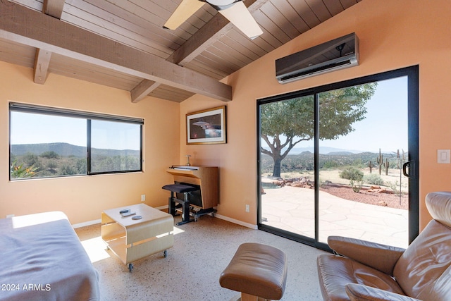 living room featuring a mountain view, lofted ceiling with beams, a wall mounted air conditioner, and a wealth of natural light