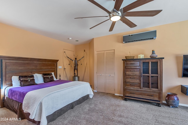 bedroom featuring a closet, ceiling fan, light colored carpet, and a wall mounted AC