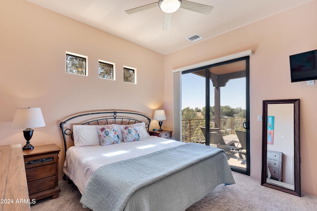 bedroom with access to outside, ceiling fan, and light carpet