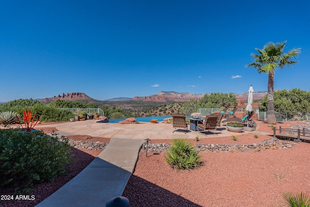 exterior space featuring a patio and a mountain view