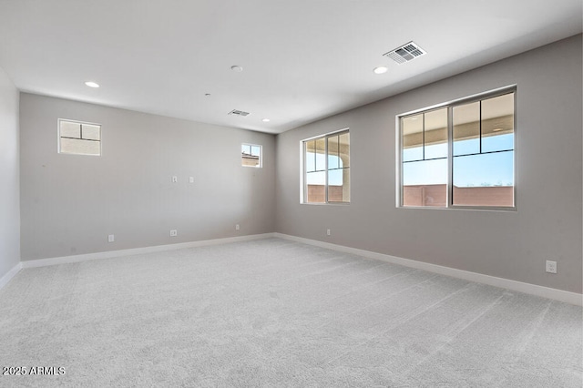 12219 W Caraveo Pl, Peoria, AZ 85383 - unfurnished room with recessed lighting, baseboards, and light carpet