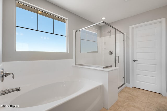 12219 W Caraveo Pl, Peoria, AZ 85383 - bathroom featuring a garden tub, a stall shower, and recessed lighting