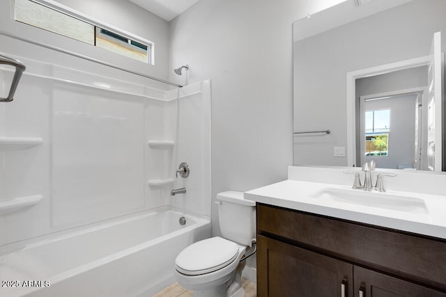 12219 W Caraveo Pl, Peoria, AZ 85383 - bathroom with vanity, toilet, plenty of natural light, and shower / tub combination