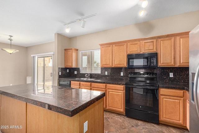 kitchen featuring backsplash, a sink, tile countertops, and black appliances