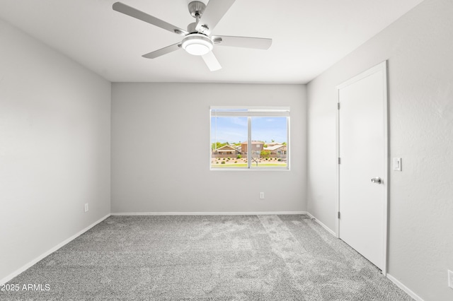 11215 W Heatherbrae Dr, Phoenix, AZ 85037 - carpeted empty room featuring a ceiling fan and baseboards