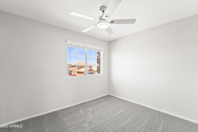 11215 W Heatherbrae Dr, Phoenix, AZ 85037 - unfurnished room with ceiling fan, carpet floors, and baseboards