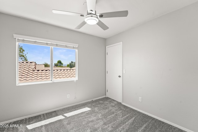 11215 W Heatherbrae Dr, Phoenix, AZ 85037 - carpeted spare room featuring baseboards and a ceiling fan