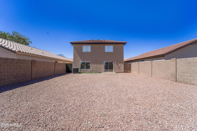 11215 W Heatherbrae Dr, Phoenix, AZ 85037 - rear view of house featuring central AC unit, a fenced backyard, stucco siding, and a tiled roof