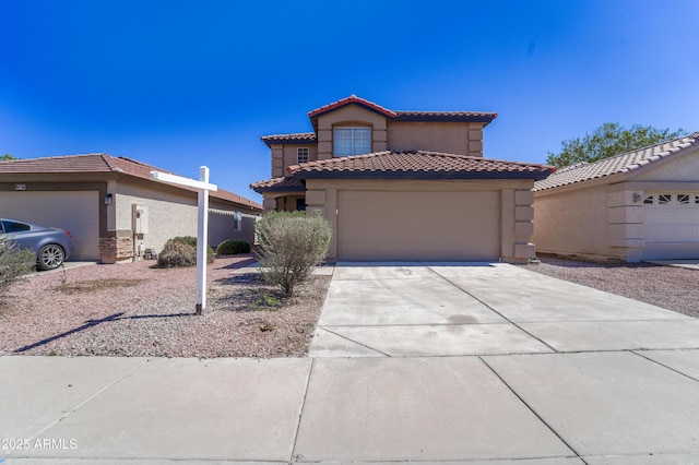 11215 W Heatherbrae Dr, Phoenix, AZ 85037 - mediterranean / spanish house featuring a tile roof, stucco siding, concrete driveway, and an attached garage
