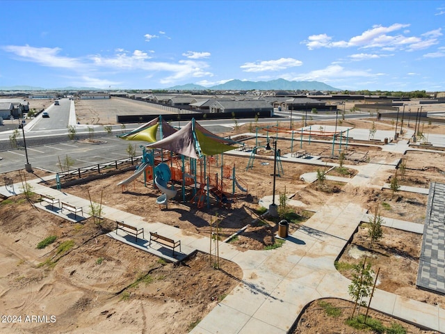 communal playground with a mountain view