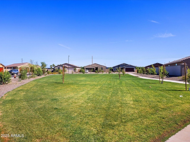 view of yard with a residential view