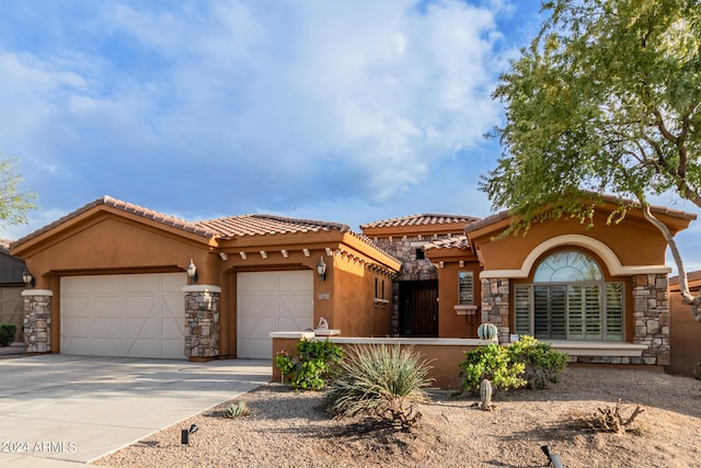 view of front of property featuring a garage