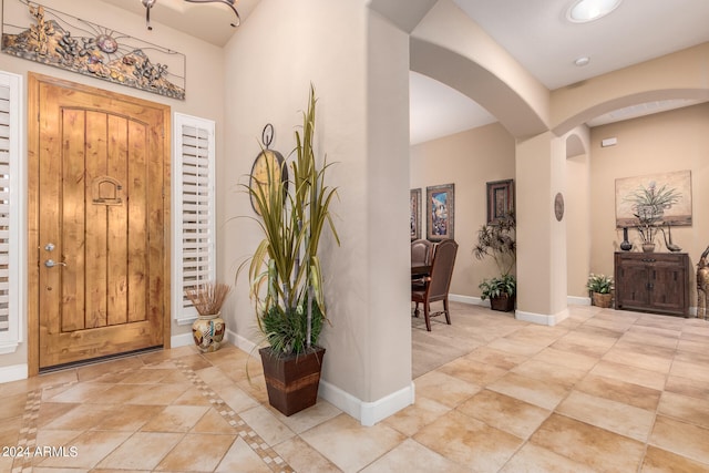 entryway featuring light tile patterned floors