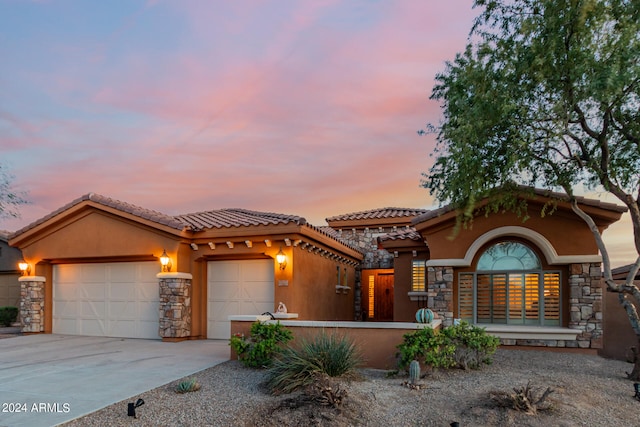 view of front of home featuring a garage