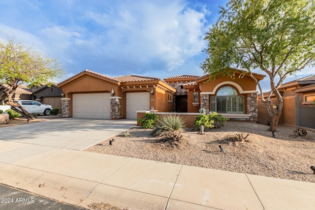 view of front of home with a garage