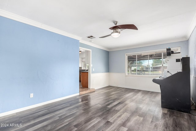 interior space featuring sink, ceiling fan, dark hardwood / wood-style flooring, and crown molding