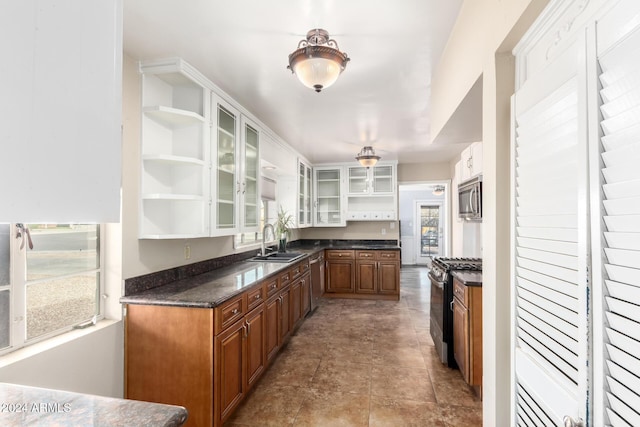 kitchen with sink and appliances with stainless steel finishes