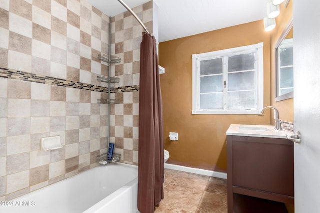 full bathroom with vanity, toilet, and shower / tub combo with curtain