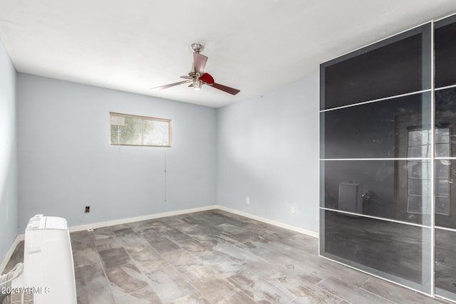 spare room featuring ceiling fan