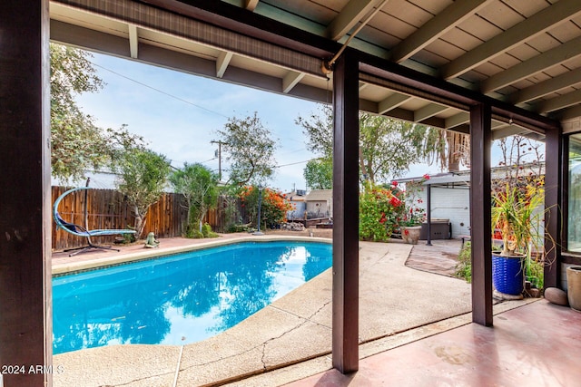 view of pool featuring a patio