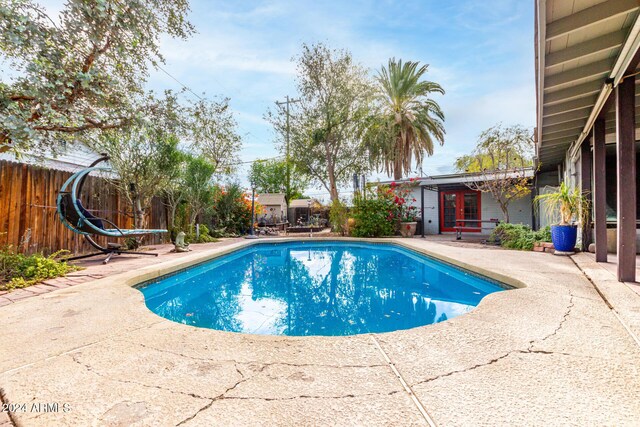 view of pool featuring a patio