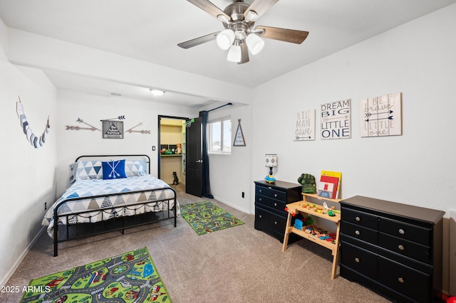 bedroom with ceiling fan and carpet