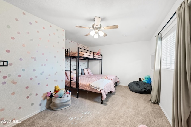 bedroom with light carpet and ceiling fan