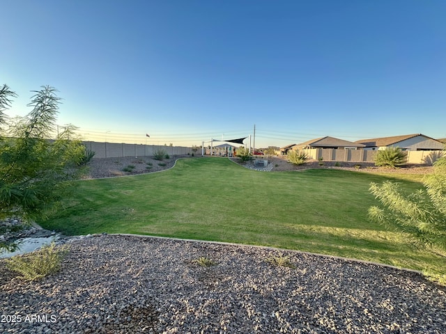 view of yard with fence