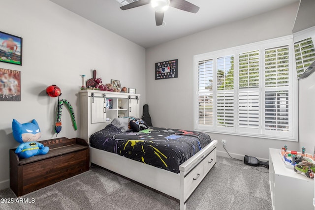 bedroom with carpet floors, ceiling fan, and baseboards